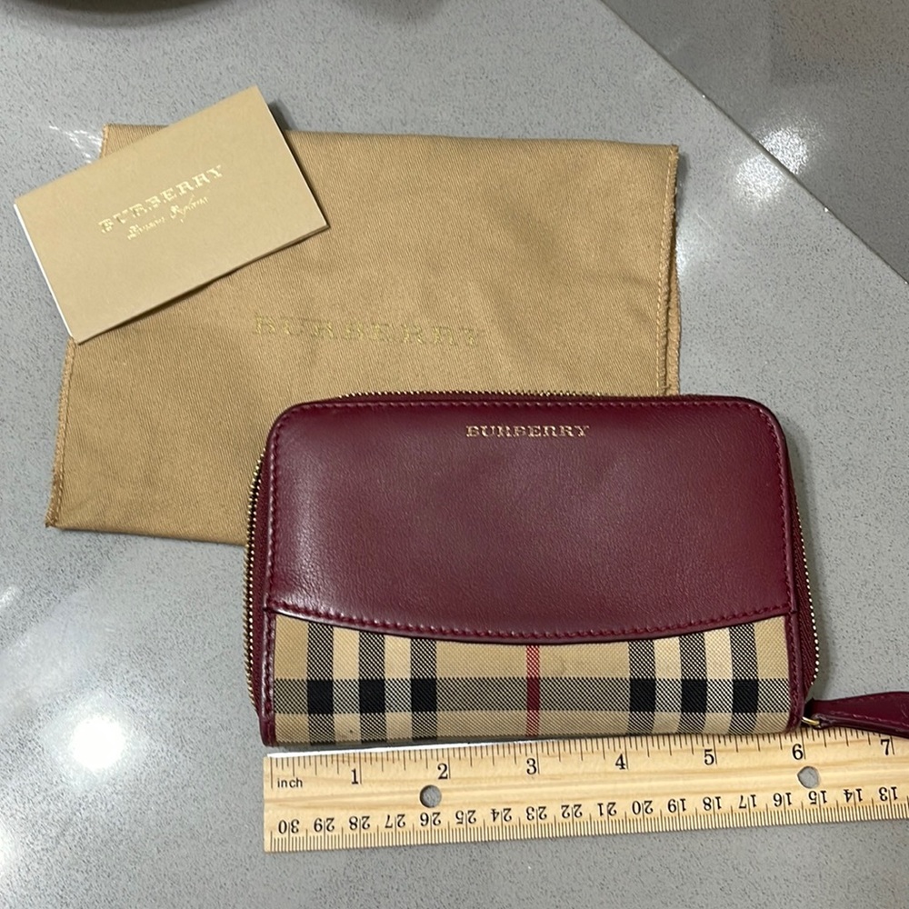 Burberry zippy wallet maroon color